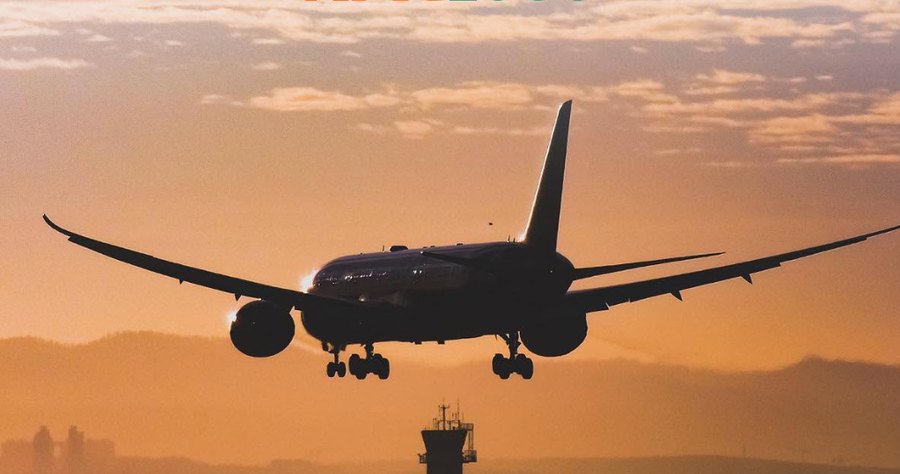 Aircraft on approach at sunset